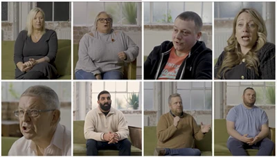 eight people sitting down having a conversation