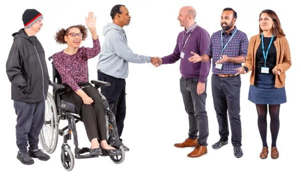 A group of people stand together