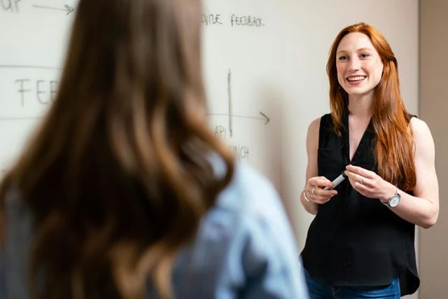a trainer delivers a course