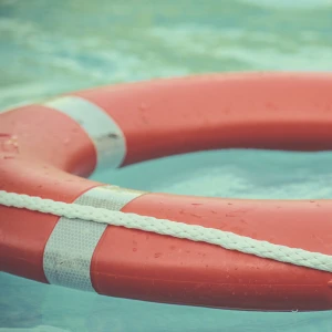 A red rubber ring in the water