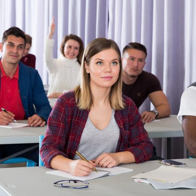 group of adult learners in a classroom