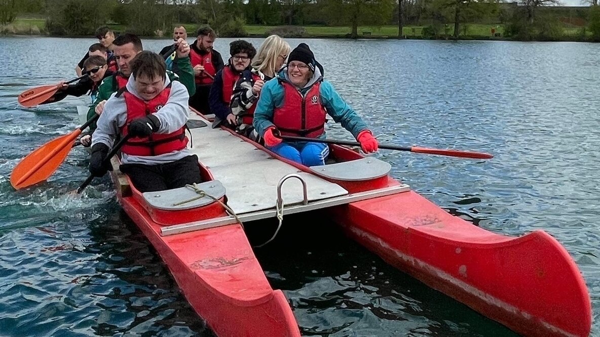 An image of people bell boating