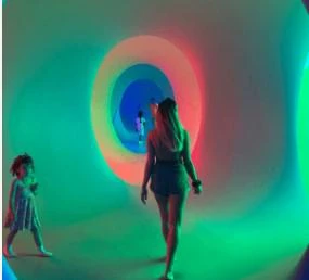 Child and adult inside the colourscape experience