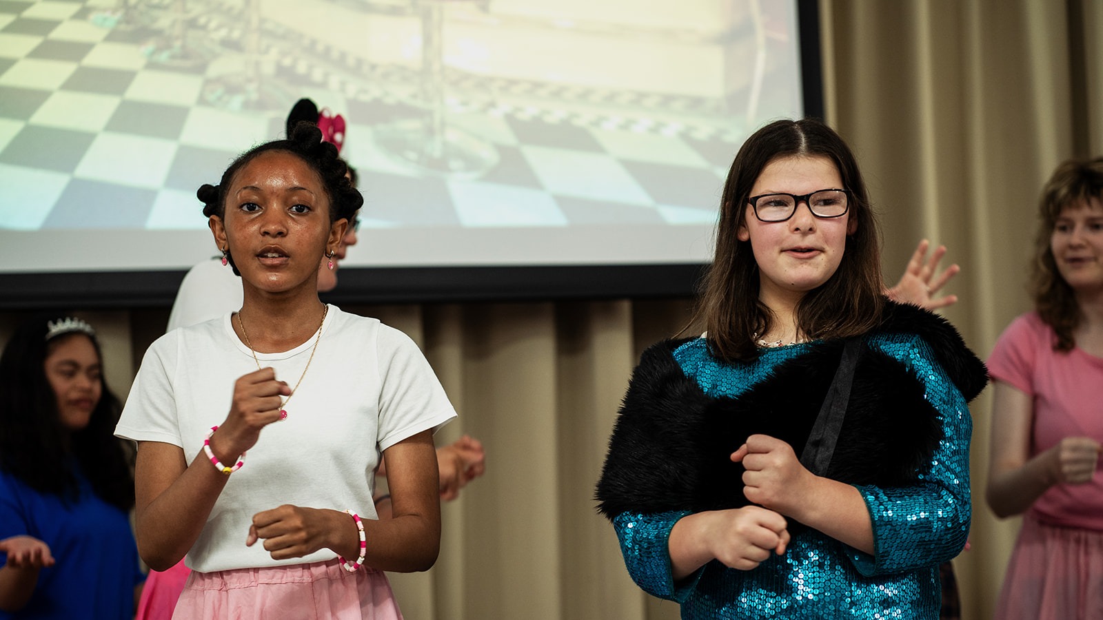 photo of 2 girls on stage