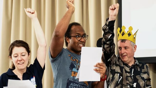 People cheering with excitement