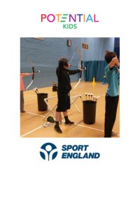 Child taking part in archery session