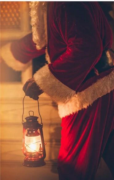 Image of Santa holding a lantern