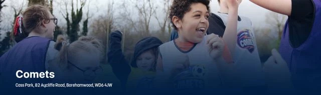 Event image showing children happy on a football pitch