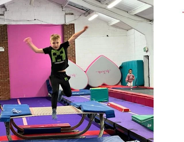 Young boy on a trampoline